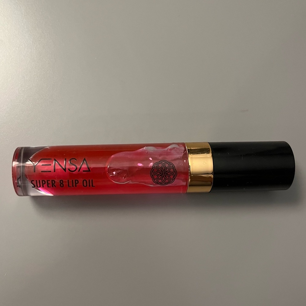 Gently used SUPER 8 LIP OIL in shade pink shine